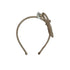 Rose gold headband with crystals on a white background
