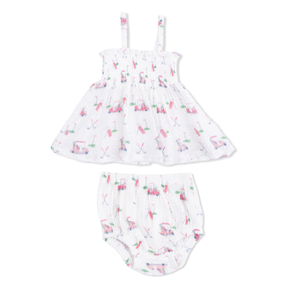 Baby dress and bloomers set with golf pattern on a white background