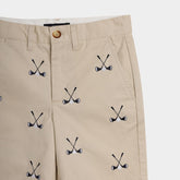 Beige pants with golf club pattern on a white background
