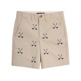 Beige shorts with black golf club pattern on a white background