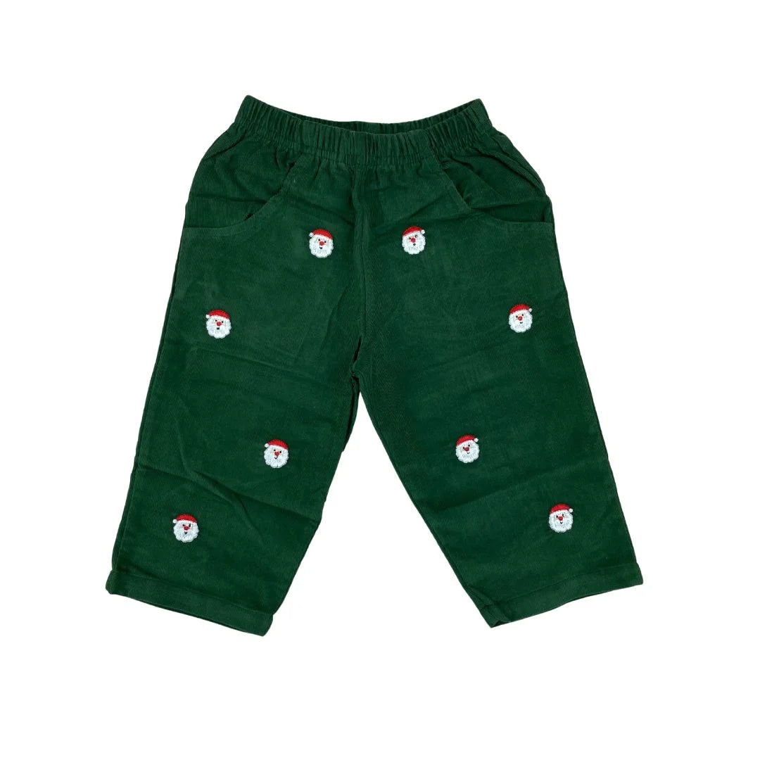 green pants with little embroidered santa faces all over