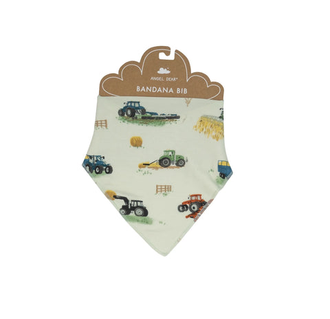 green bib with red, blue and green farm tractors