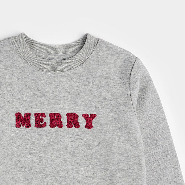 long sleeve grey sweatshirt with "Merry" written in red