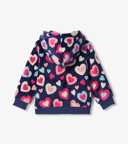A navy blue fleece hoodie with an all-over heart pattern in pink, red, and light blue, shown from the back on a light gray background.