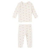 Baby pajamas with heart pattern on a white background