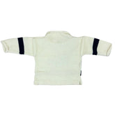 Light ivory baby sweater with dark black stripes on sleeves against a white background