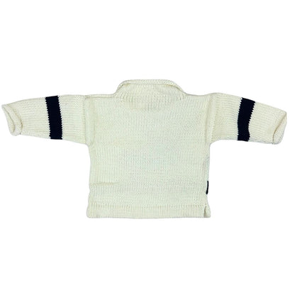 Light ivory baby sweater with dark black stripes on sleeves against a white background