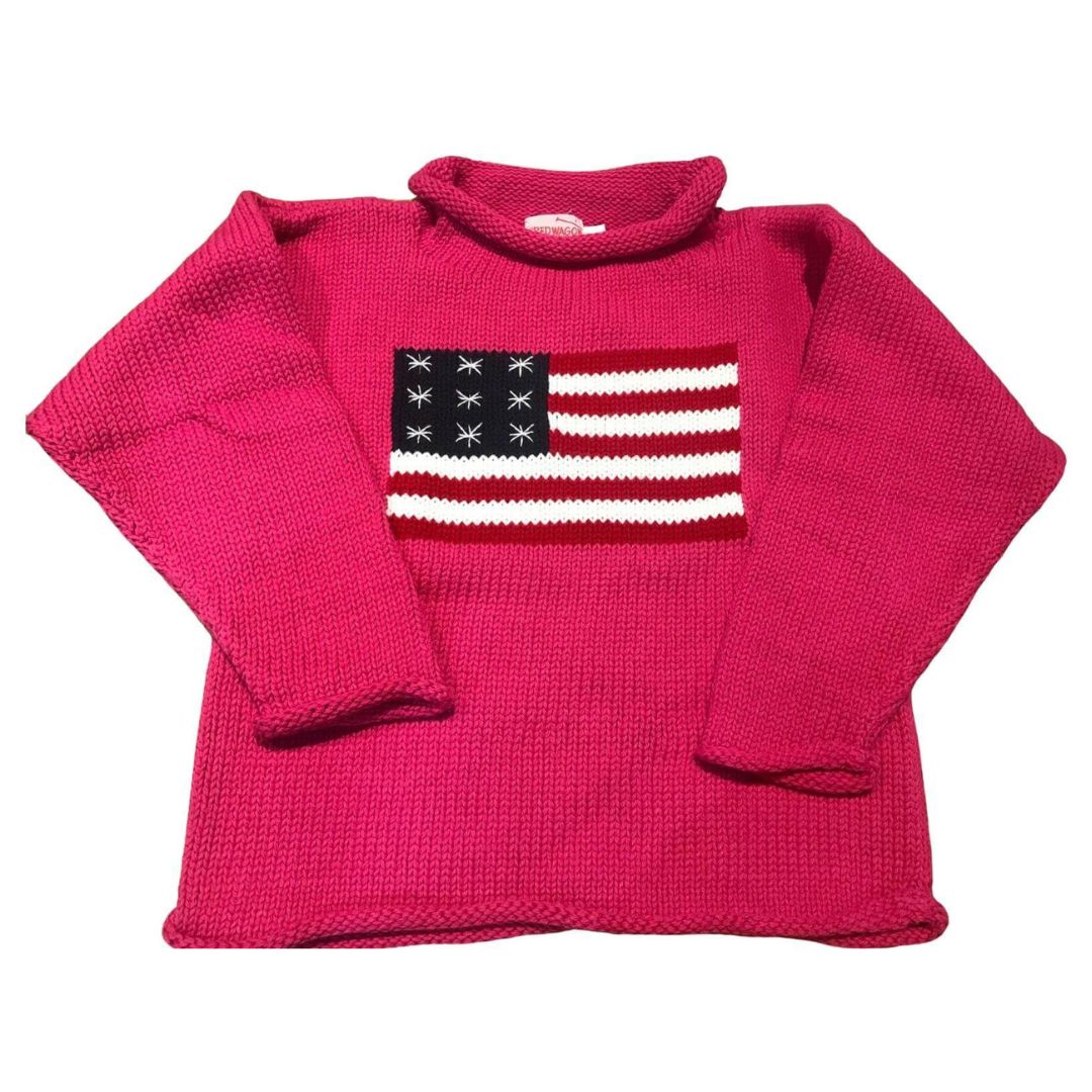 Pink sweater with an American flag design on a white background