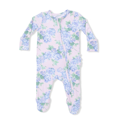 Floral patterned baby onesie on a white background