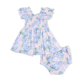 Floral dress and bloomers set on a white background