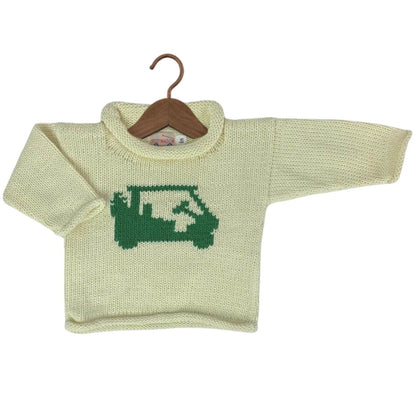 A cream-colored knit baby sweater with a green golf cart design on the chest, displayed on a wooden hanger against a white background.