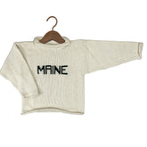 An off-white knit sweater with &