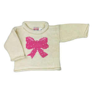 long sleeve ivory sweater with pink bow with white polka dots