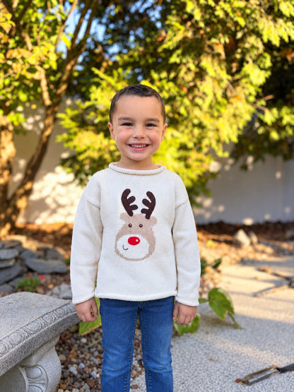 boy wearing ivory rudolph sweater and jeans