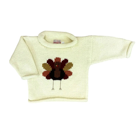 ivory long sleeve sweater with brown turkey that had maroon, yellow and orange feathers