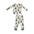 tan pajama set with green forest trees all over and green cuffs on wrists and ankles