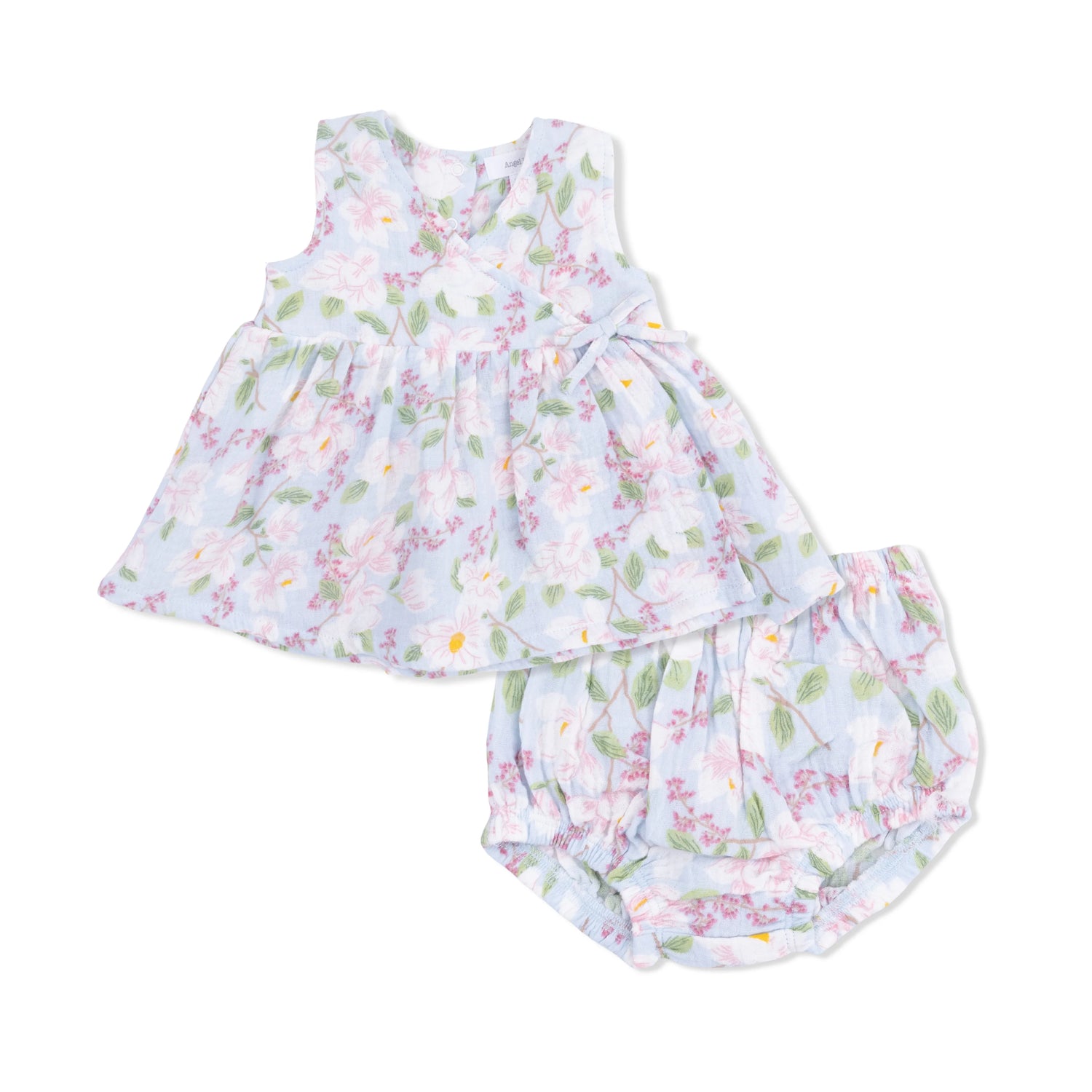 Floral baby dress and bloomers set on a white background