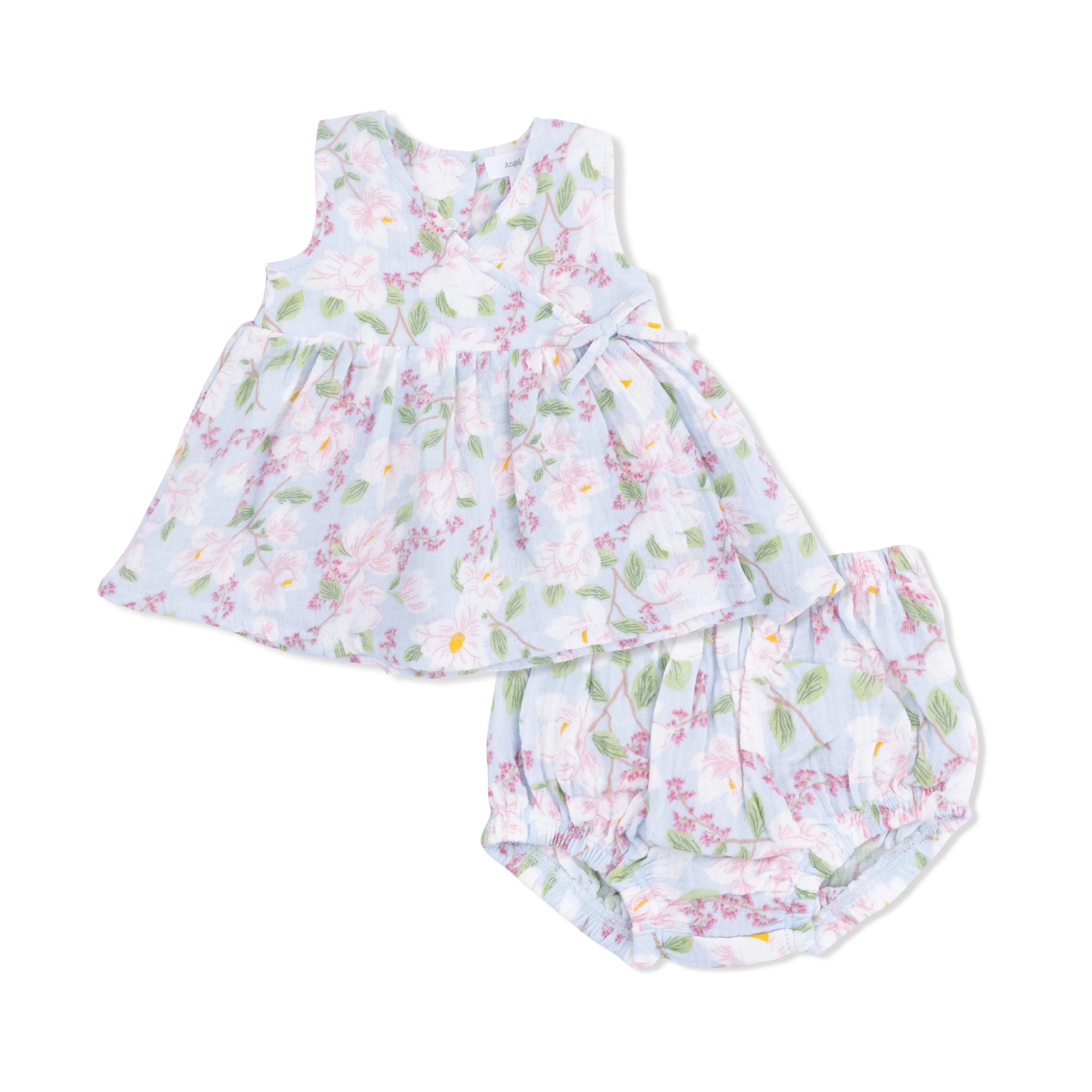 Floral baby dress and bloomers set on a white background