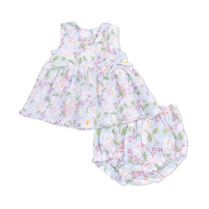 Floral baby dress and bloomers set on a white background