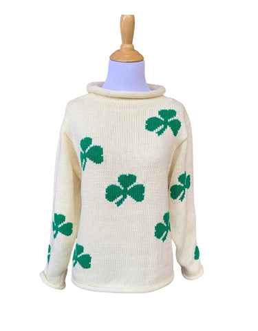 ivory roll neck sweater with green shamrocks knitted all over