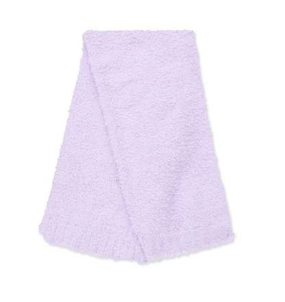 A light purple textured blanket folded neatly on a solid white background.
