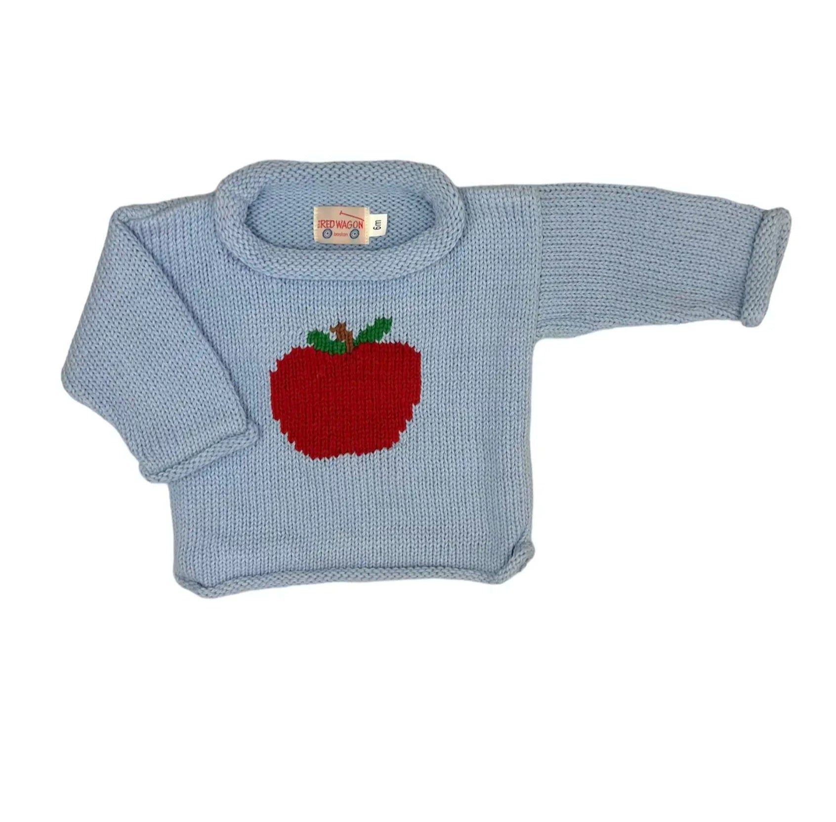 long sleeve light blue sweater with red apple in center
