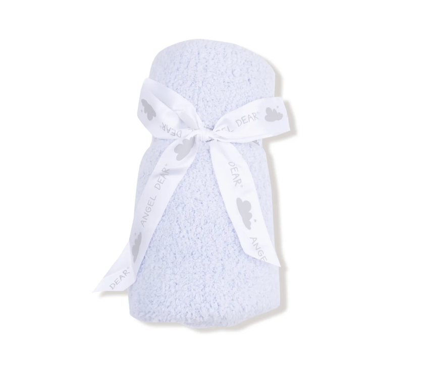 A light blue baby blanket roll wrapped with a white ribbon printed with the words &