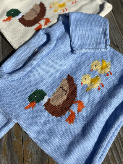 sweater on wood background