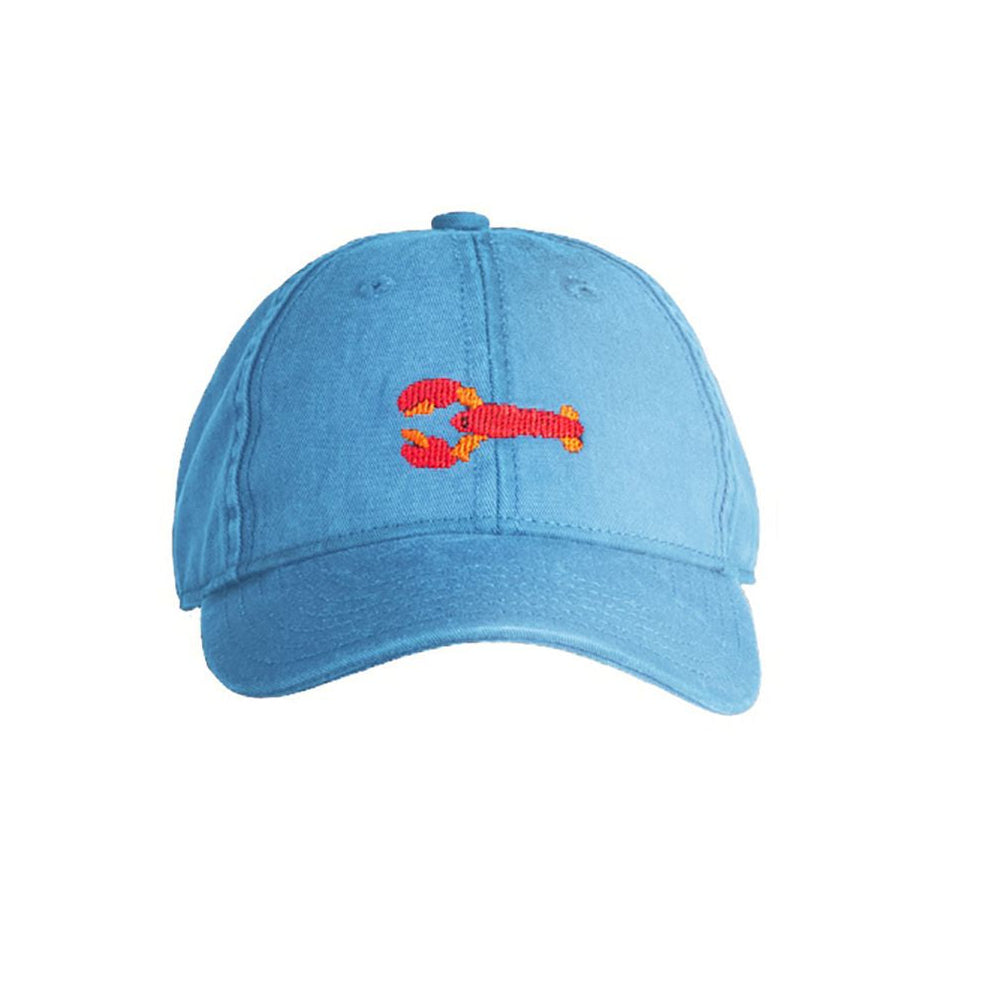 Blue cap with a red lobster on a white background
