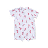 White romper with red lobster pattern on a white background