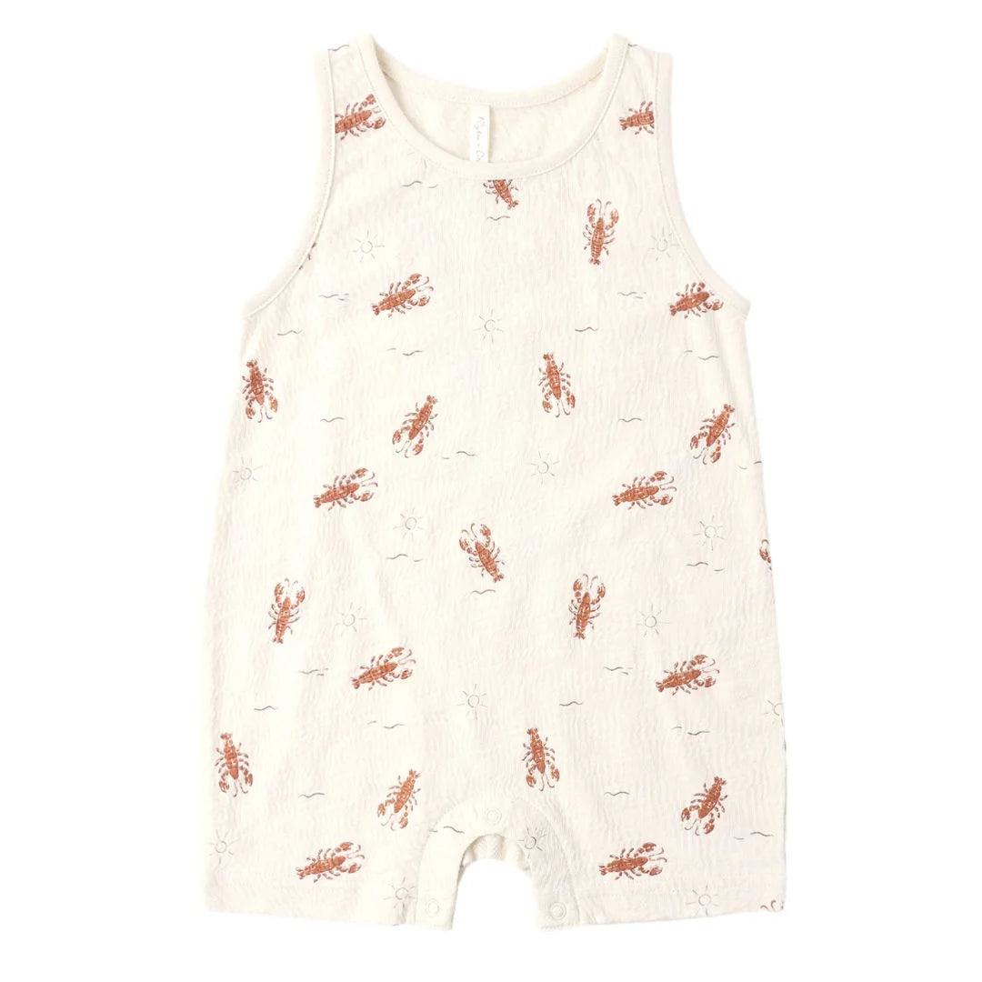 White romper with red lobster pattern on a white background
