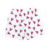 White shorts with red lobster pattern on a white background