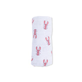 White swaddle blanket with red lobster pattern on a white background