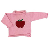 A pink ribbed knit roll neck sweater with a red apple and green leaf motif on the chest, displayed against a plain white background.