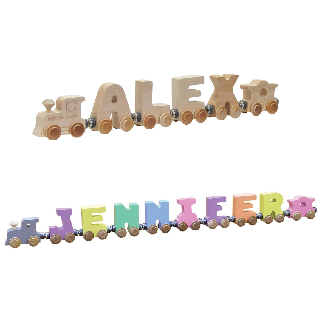 Wooden train nameplates with 'ALEX' and 'JENNIFER' on a white background
