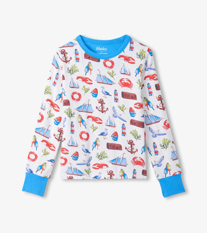 nautical pajamas, white base with nautical emblems all over with blue trim