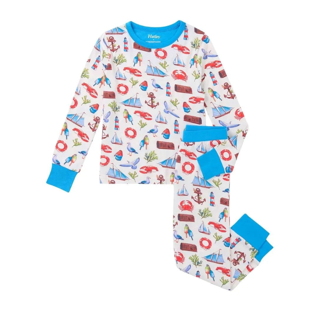 nautical pajamas, white base with nautical emblems all over with blue trim