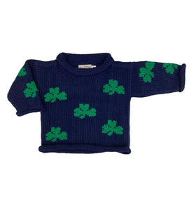 navy long sleeve sweater with green shamrocks all over