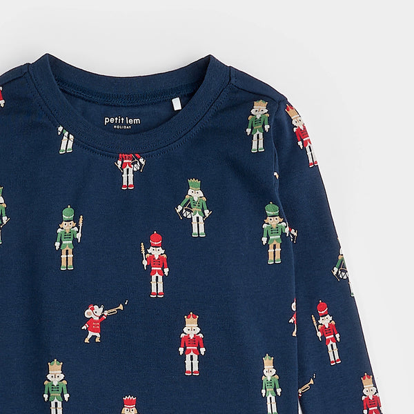 long sleeve navy pajamas with red and green nutcrackers all over