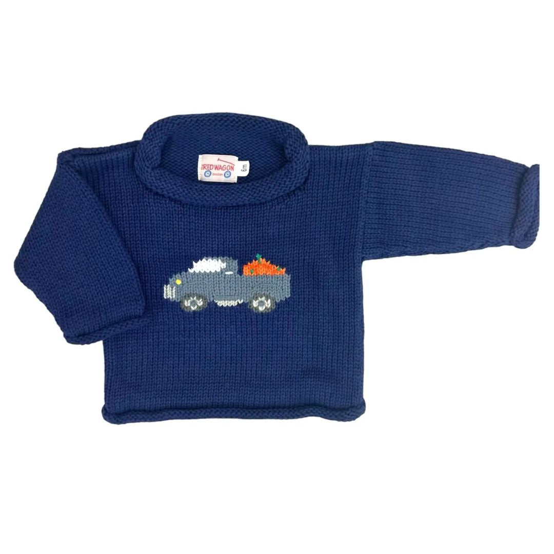 A navy blue knit baby sweater with a long-sleeve roll neck and a small knitted car graphic on the chest, displayed on a clean white background.