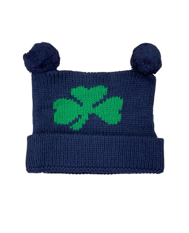navy hat with two poms and green shamrock