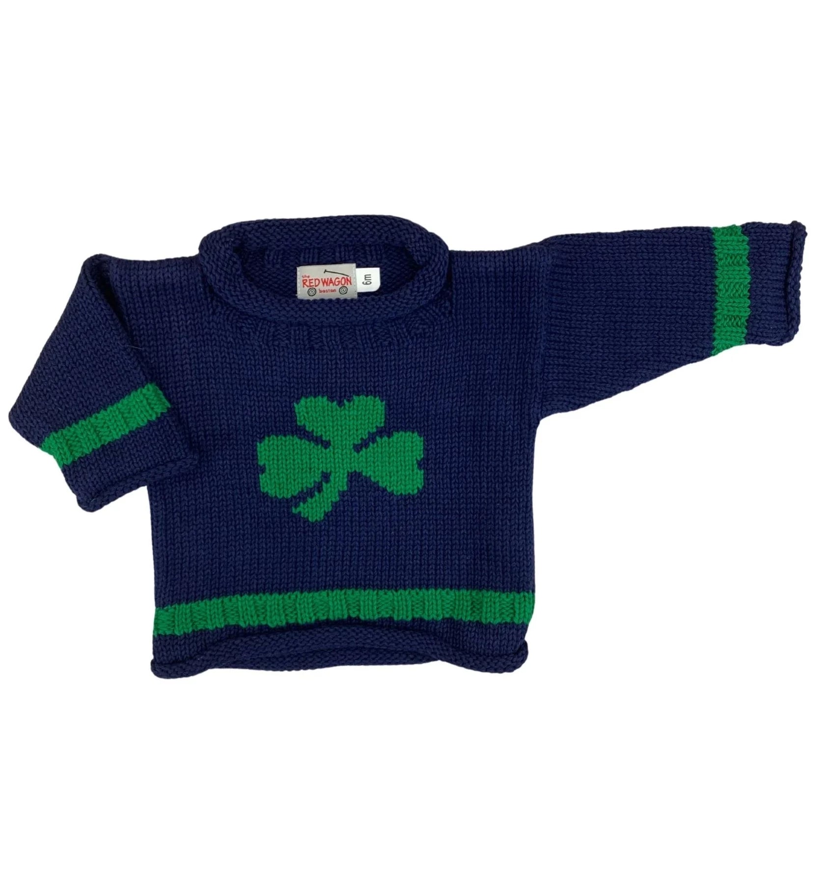 navy long sleeve sweater with green stripe on bottom and one on each wrist cuff and single green shamrock in center