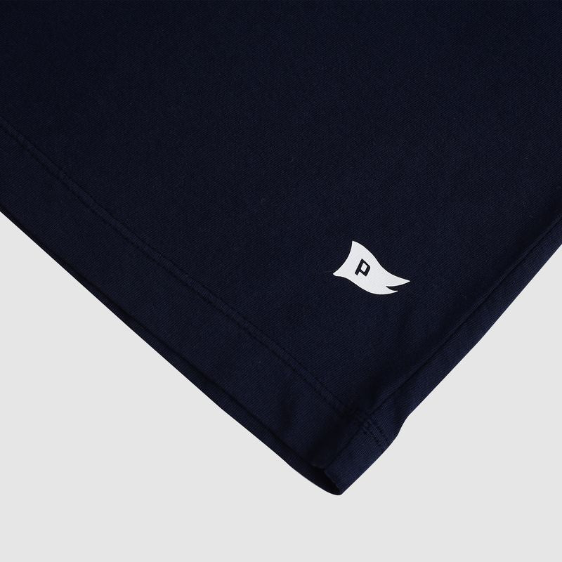 Navy blue fabric with a white logo on a light gray background