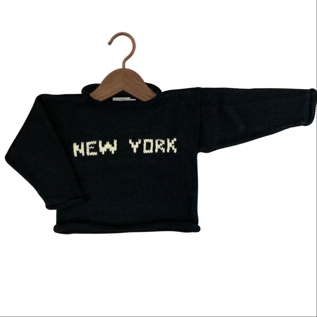 A black knit sweater with &
