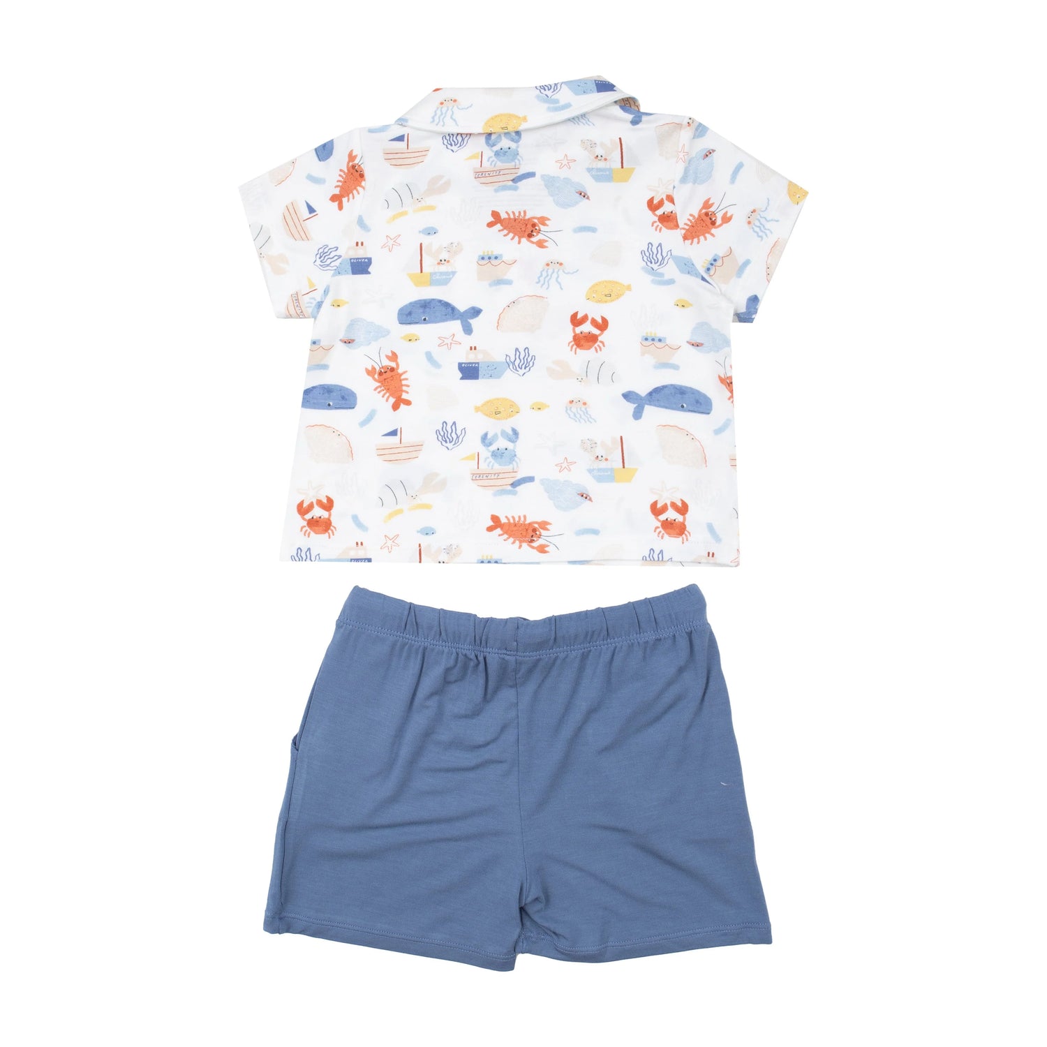 white ocean print polo shirt and matching blue shorts
