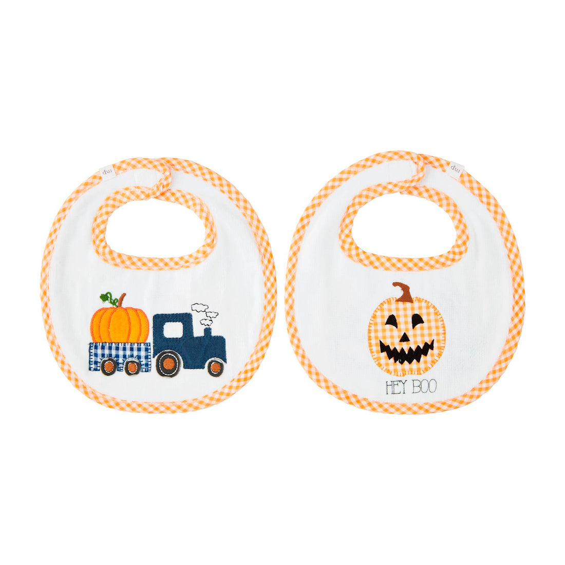 Halloween-themed baby bib with pumpkins and trucks on a white background