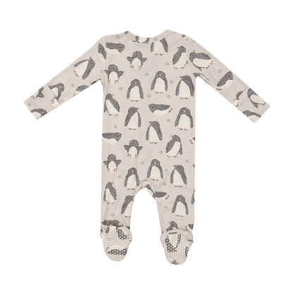 beige footie with grey and white penguins all over and tiny stars