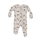 beige footie with grey and white penguins all over and tiny stars