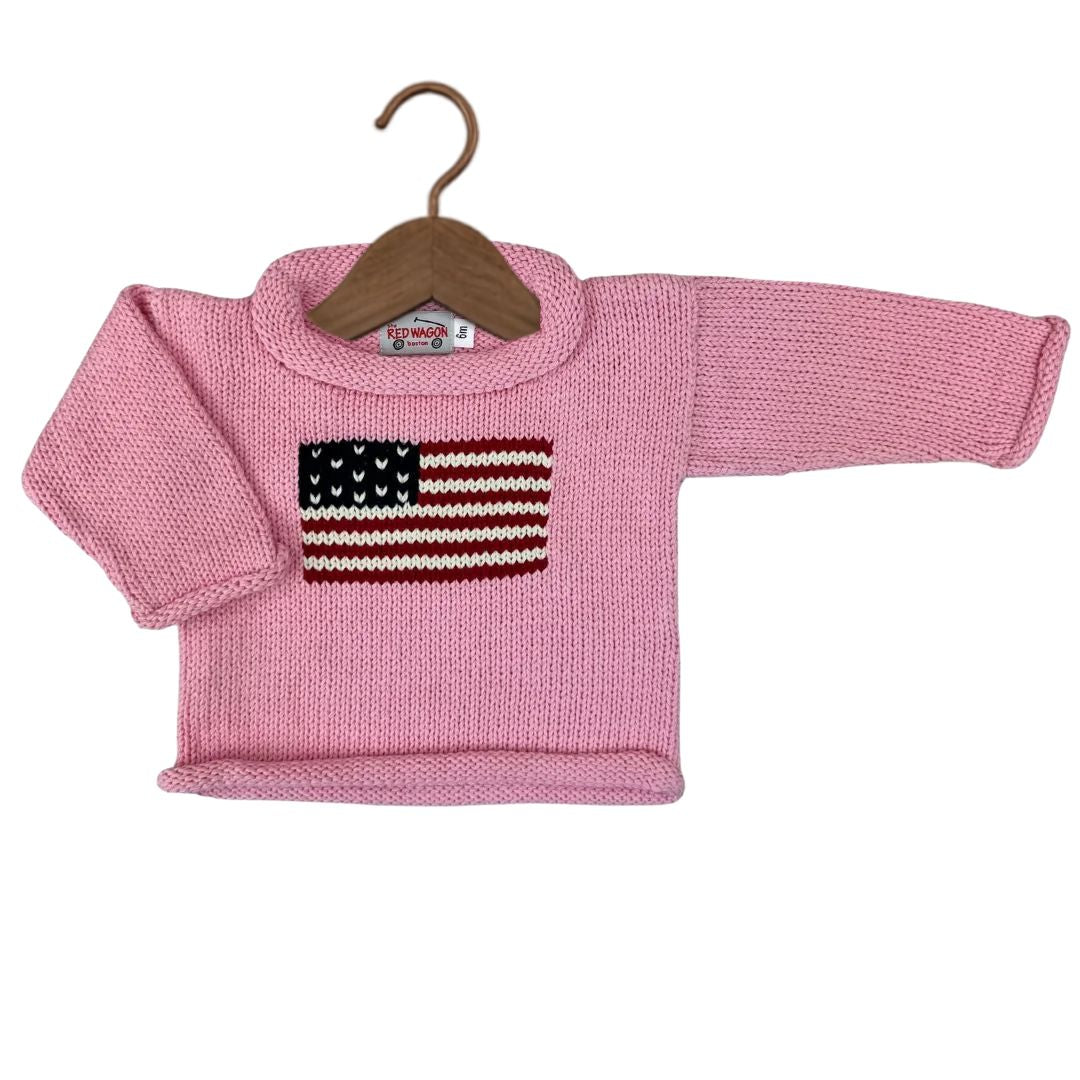 Pull rose à col roulé avec drapeau américain
