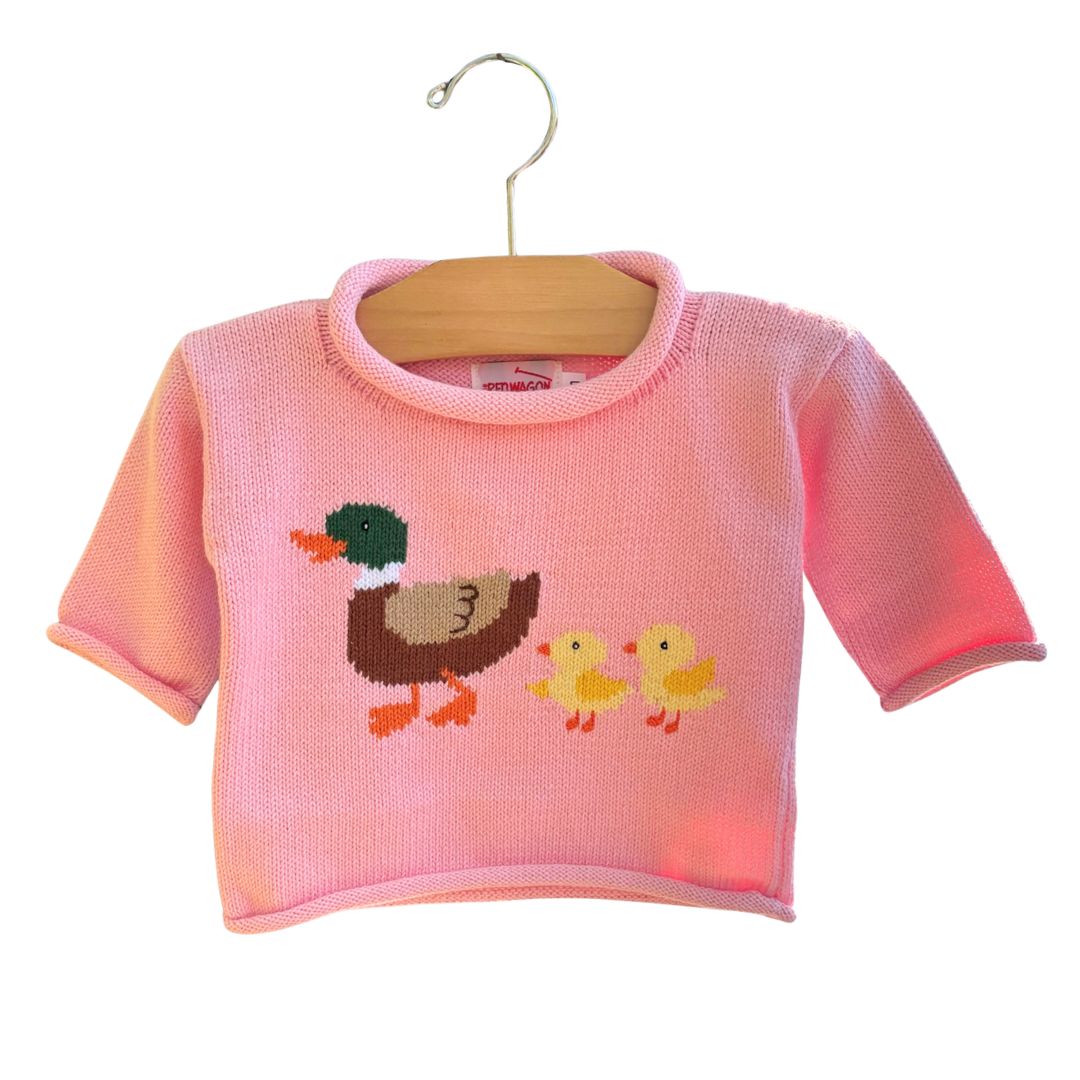 pink sweater with mallard duck and two ducklings following behind